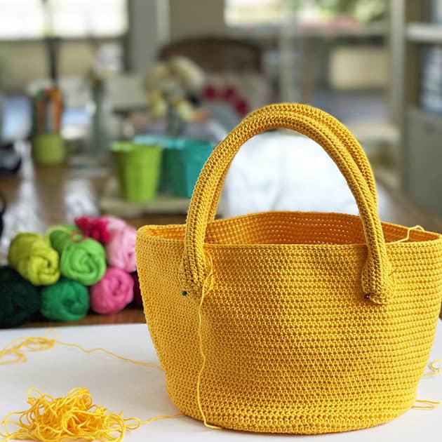 yellow crochet bag